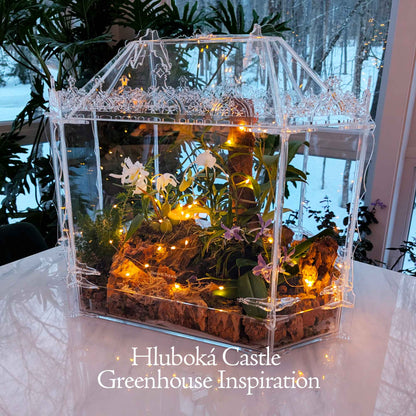 Handcrafted Victorian Gothic terrarium inspired by the historic greenhouses of Hluboká Castle. Front view showcasing intricate acrylic design, perfect for orchids and tropical plants.