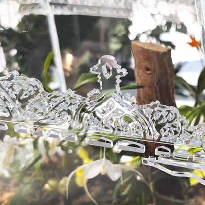 Close-up view showcasing the precise laser-cut detailing of the Victorian Gothic terrarium. Inspired by the historic greenhouses of Hluboká Castle, designed for orchids and tropical