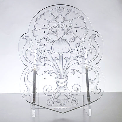 Detailed close-up of the Floral Design 2 engraved on the Orchid Mounting Platform, emphasizing the craftsmanship of the acrylic display.