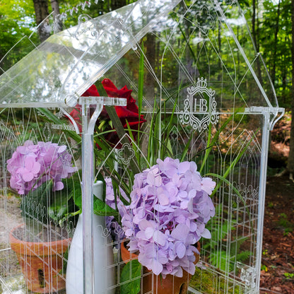 Gothic-inspired terrarium showcasing intricate engraving and detailed cutwork design, highlighting fine craftsmanship and architectural beauty.